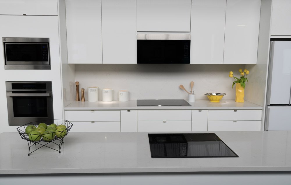 black quartz countertops white cabinets