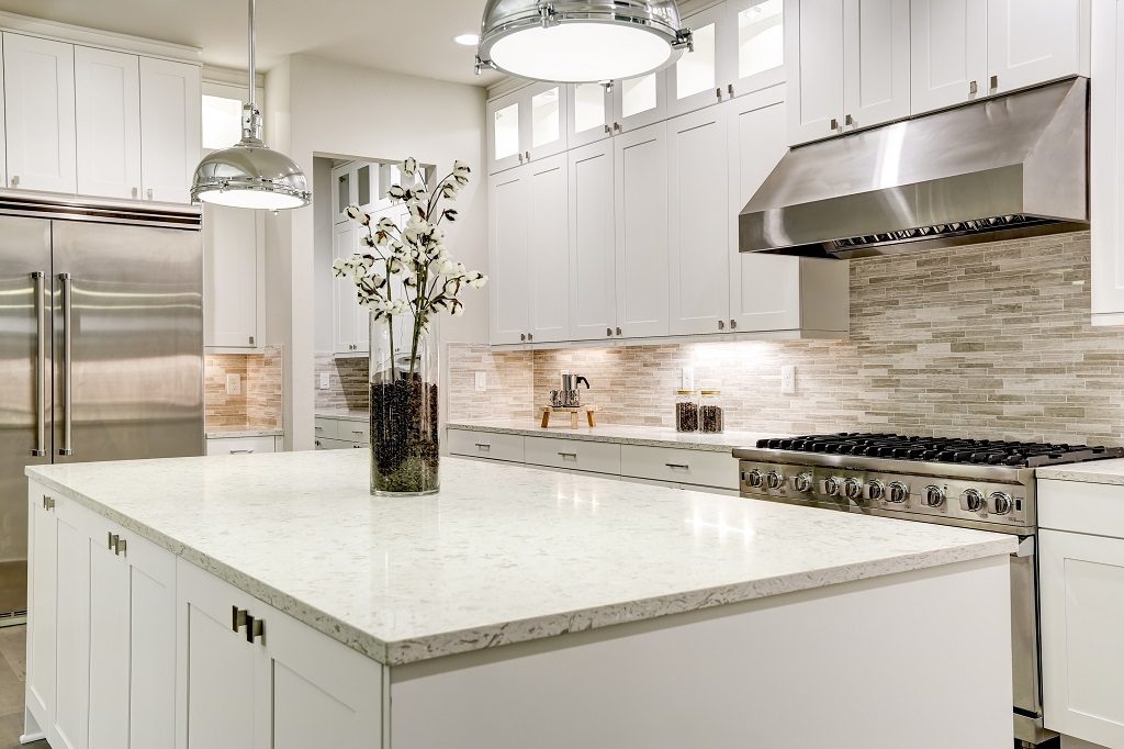 Flowers on the white granite countertop